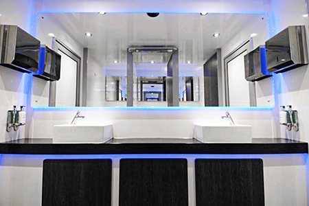 Modern mirrored interior with hand basins