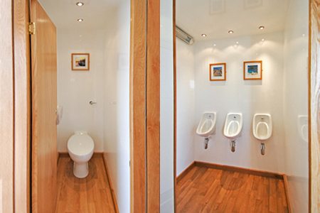 Modern clean interior showing urinals